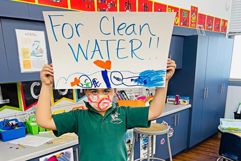 Kid with sign